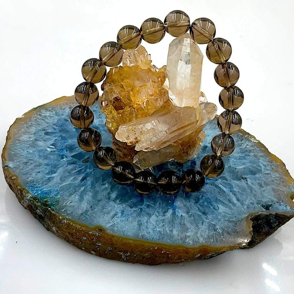 Vtg 7”Stretchable Smokey Quartz Bracelet (1988) - Picture 1 of 7